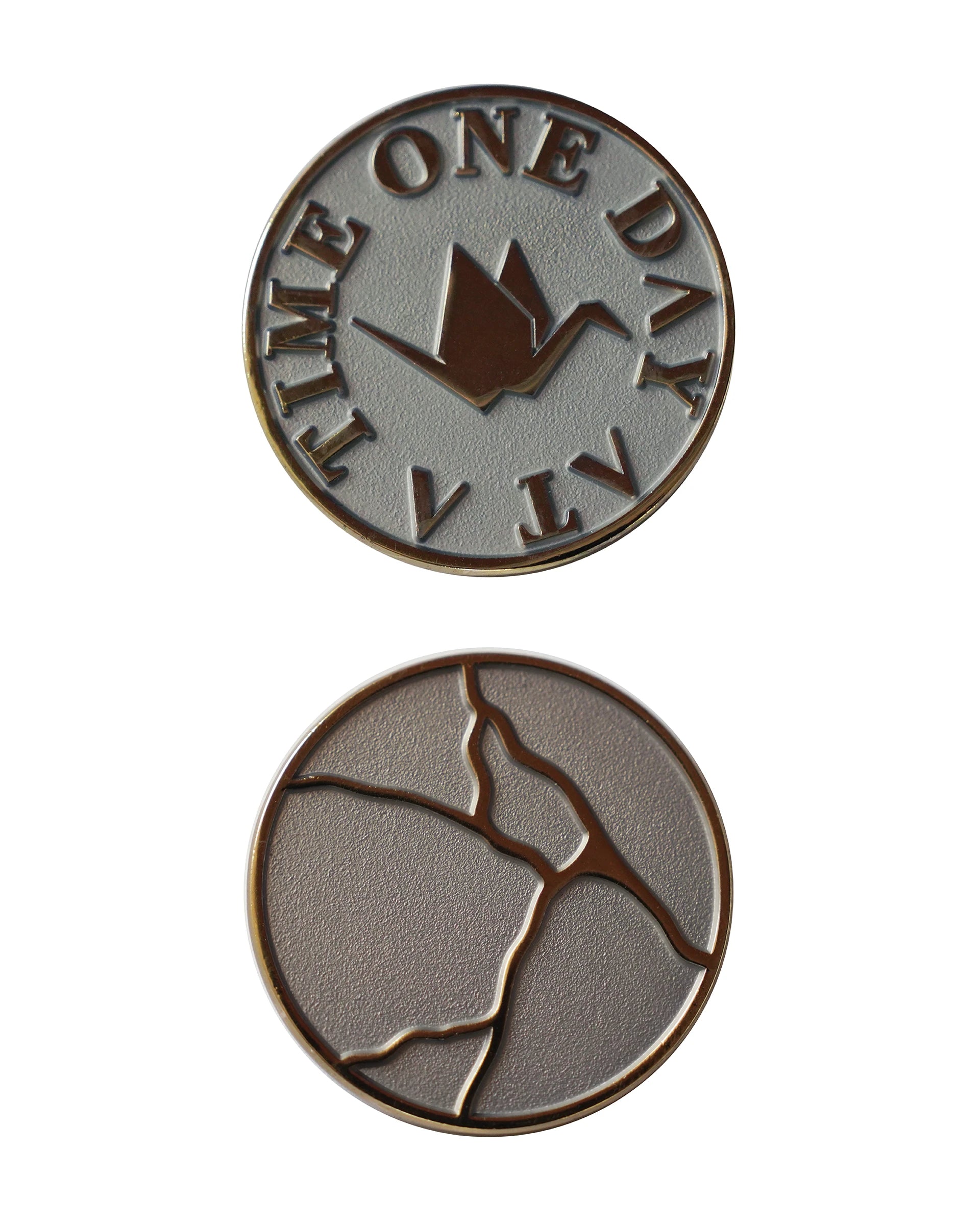 ODAAT Medallion – Kintsugi Edition, silver finish. Front side shows bronze origami crane with “ONE DAY AT A TIME” text; reverse side features gold kintsugi crack design on a matte silver background.