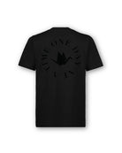 Back of Circle of Resilience Tee in Obsidian showing a tonal crane emblem encircled by the words ‘One Day At A Time.’
