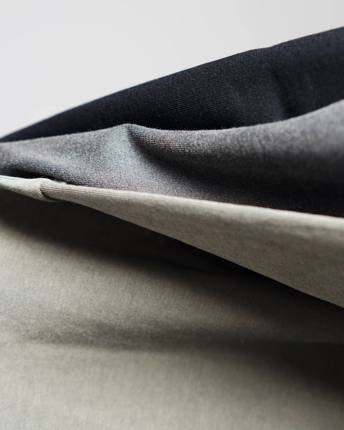 Garment-washed organic cotton jersey of the Midweight Tee, three colorways