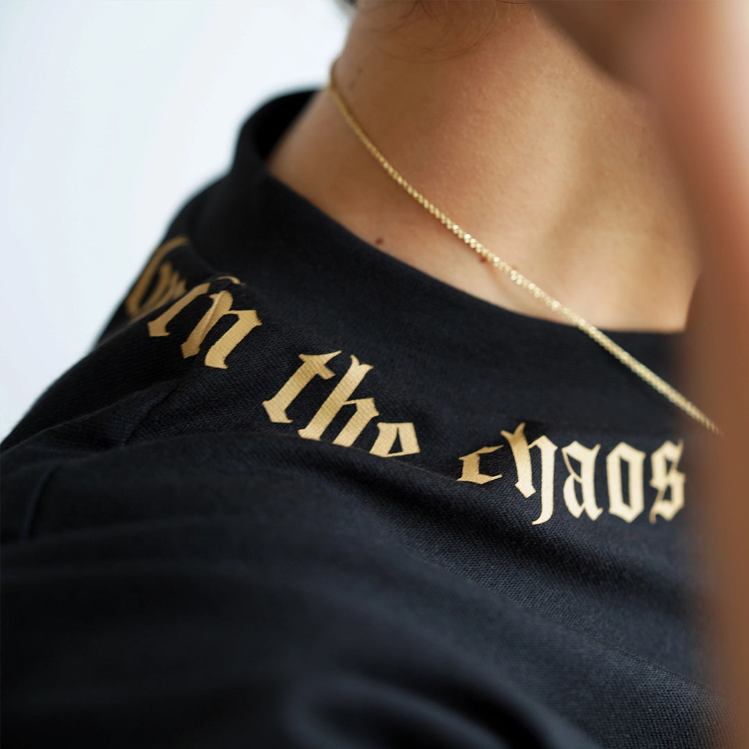 Calm in the Chaos boxy crop tee collar graphic detail
