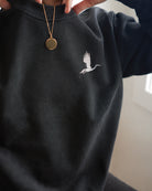 Origami Echo Crewneck in Black, crane embroidery at the chest