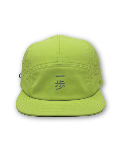 Neon green KyoPace running cap, front view, reflective kanji on the front panel and perforated side panels.