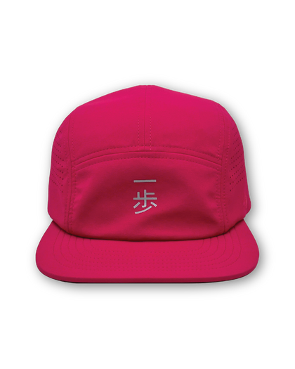 Neon pink KyoPace running cap, front view, reflective kanji on the front panel and perforated side panels.