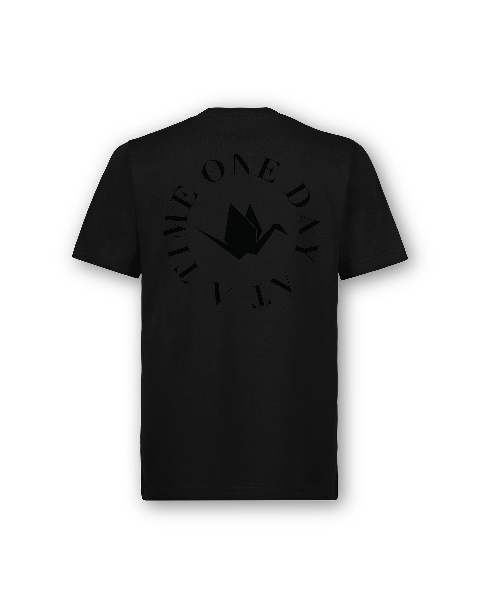 Back of Circle of Resilience Tee in Obsidian showing a tonal crane emblem encircled by the words ‘One Day At A Time.’