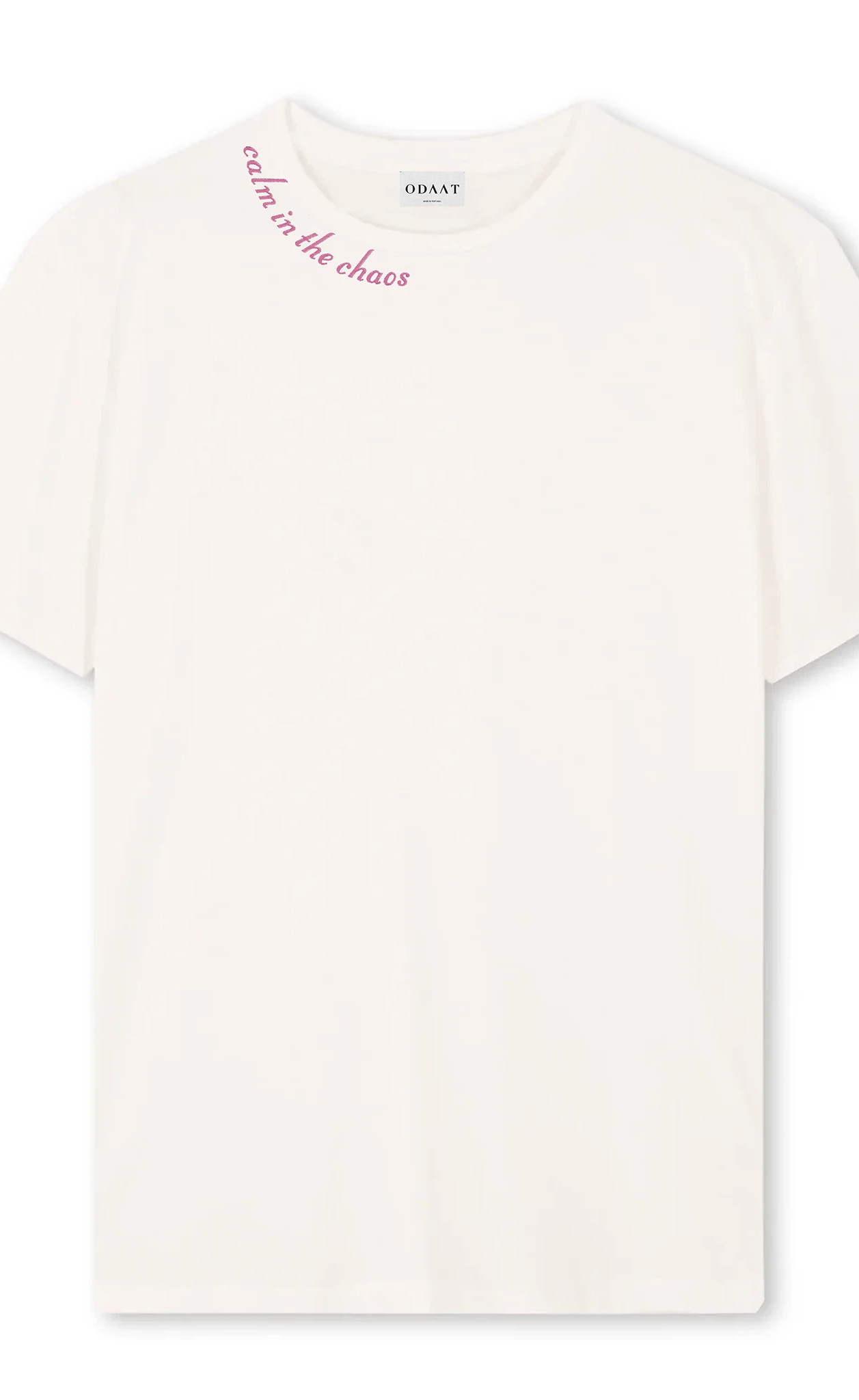 ODAAT Apparel, vintage white t-shirt with the words "calm in the chaos" embroidered on the neckline in pink. 